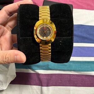 Rado Gold Watch with Silver Accents